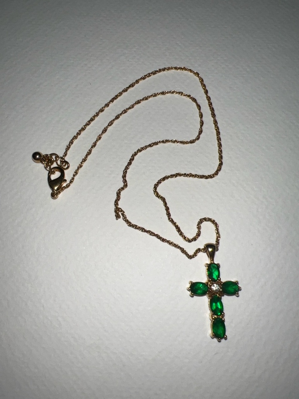 Avon ‘NR’ Gold-tone Cross Necklace with Green Gemstones - Picture 2 of 5